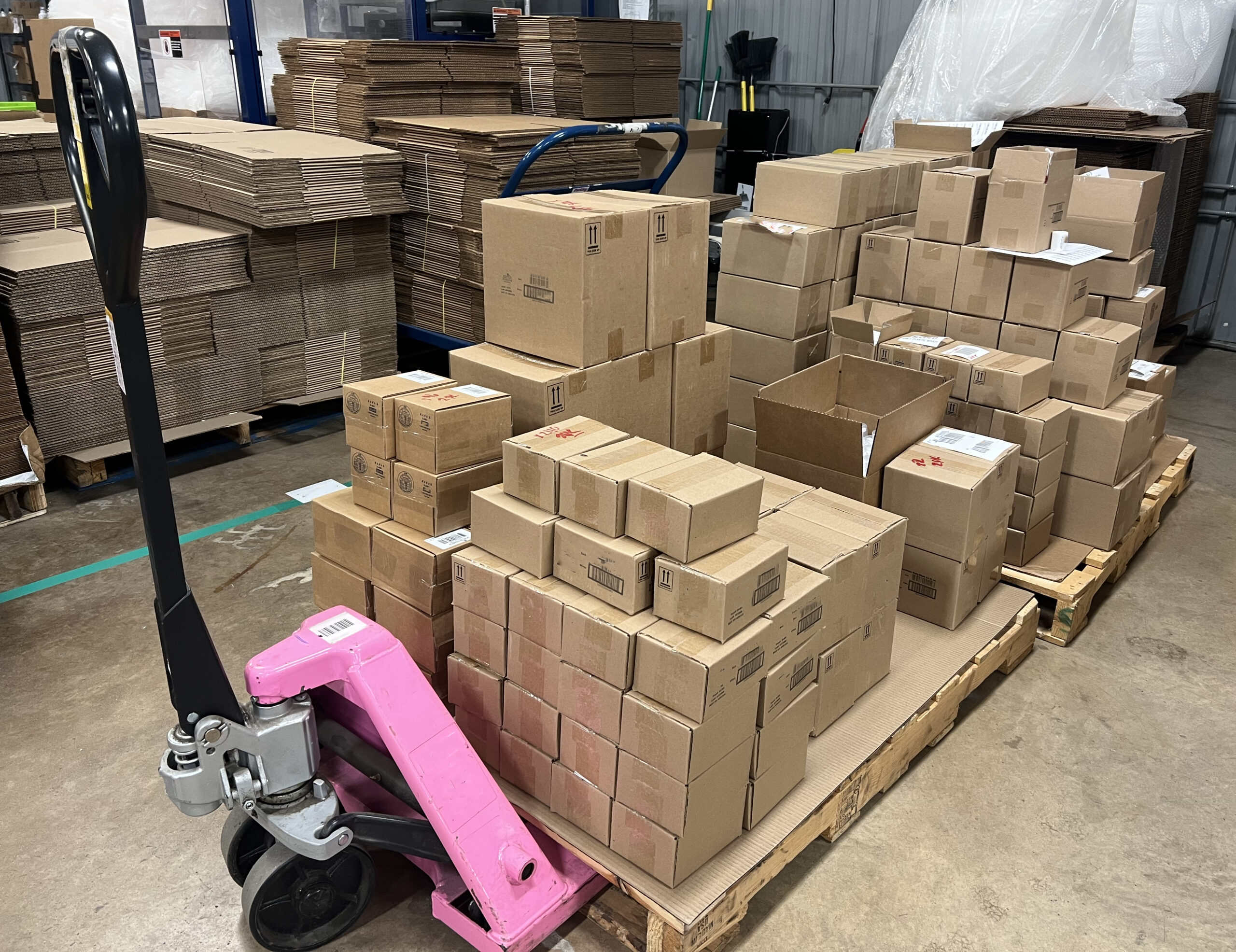 boxes stacked on pallet jack